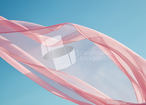 Image of Flying pink transparent fabric wave on blue background and illum