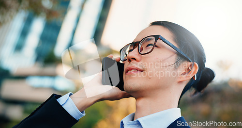 Image of Phone call, city or face of professional man planning, networking and consulting with mobile user in negotiation. Cellphone, conversation or Japanese businessman talking with contact on urban commute