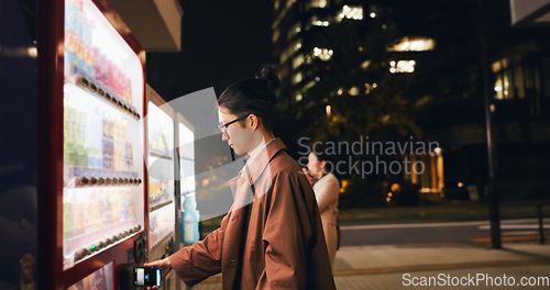 Image of Vending machine, man and phone payment at night, automatic digital purchase or choice in city outdoor. Smartphone, shopping dispenser and Japanese business person on mobile technology in urban Tokyo