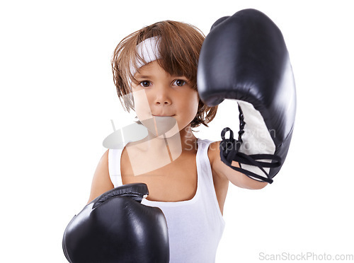 Image of Boxing, fist and portrait of child in fight with courage and learning martial arts in white background. Challenge, boxer or kid with training in self defense, exercise or practice with gear in studio