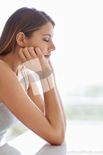 Image of Woman, eyes closed and tired fatigue in home for work burnout or exhausted for anxiety, insomnia or lazy. Female person, hands and desk for morning rest or sleepless from thoughts, drowsy or drained