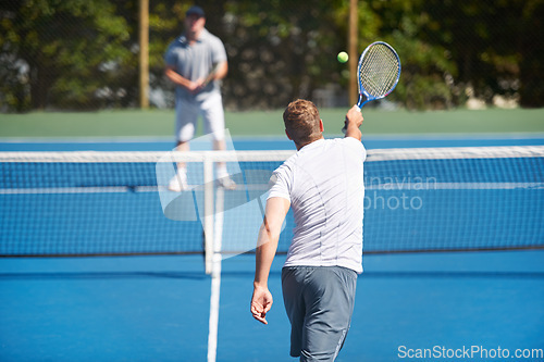 Image of Tennis, game and men with fitness, friends and competition with training and exercise with a ball. Players, practice and guys with rackets and court with workout and sunshine with challenge or cardio