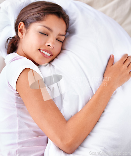 Image of Sleeping, blanket and woman relax in bedroom for comfort, cozy nap and eyes closed in Costa Rica home. Bed, weekend break and top view of person sleep on cotton fabric with calm, peace and wellness