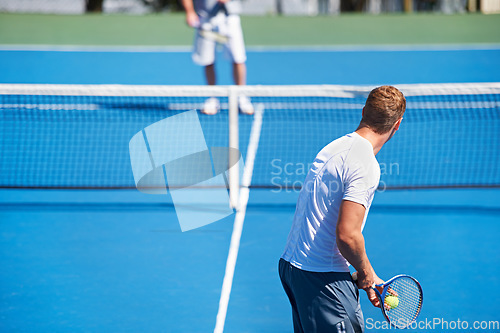 Image of Tennis, game and men with fitness, challenge and competition with training and exercise. Players, friends and guys with rackets and court with workout and sunshine with a match and cardio with a ball