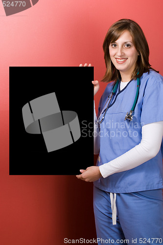 Image of Happy Nurse With Sign