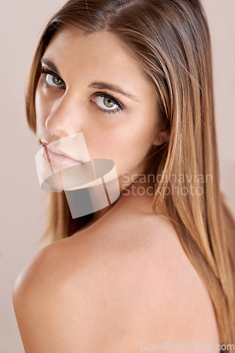 Image of Confident, cosmetics and portrait of young woman with natural, glow and glamour facial routine. Makeup, beauty and serious attractive female person with self care, dermatology and face treatment.