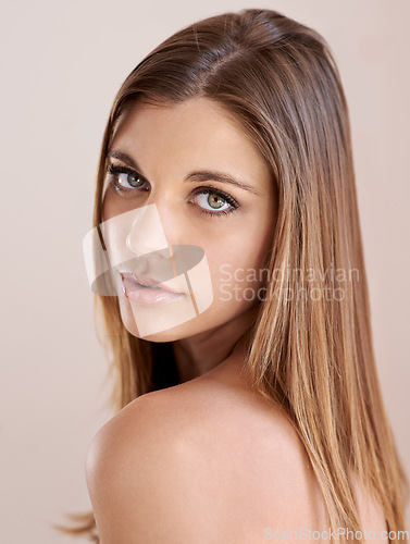 Image of Beauty, makeup and portrait of young woman with natural, glow and glamour facial routine. Confidence, cosmetics and serious attractive female person with self care, dermatology and face treatment.