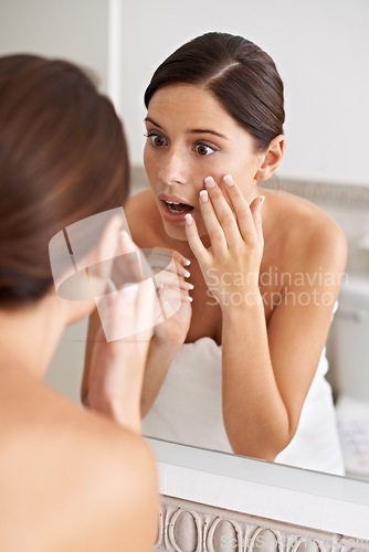 Image of Beauty, mirror reflection or woman stress over melasma crisis, acne risk or pimple outbreak in home bathroom. Skincare problem, disaster or shocked person feel zit, skin or react to allergic reaction