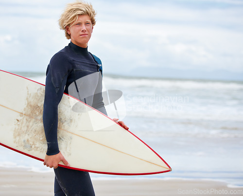 Image of Surfboard, teenager or male surfer at sea for fitness training, workout or sports exercise in Hawaii. Healthy, athlete or boy ready to start surfing on fun holiday vacation at beach, ocean or nature