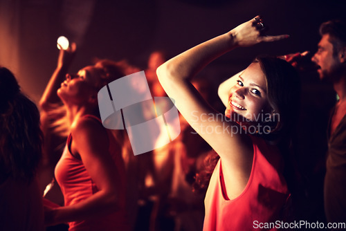 Image of Music, woman and portrait at festival with dancing for party, concert and nightclub with happiness and audience. Disco, psychedelic event and performance show with entertainment, crowd and energy