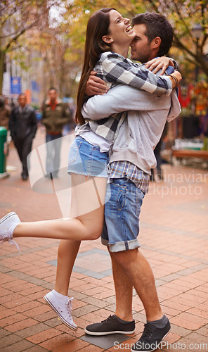 Image of Couple, hug and outdoor in city, laugh and excited with love, bonding together and romantic relationship. Cape town, embrace and enjoy with boyfriend and girlfriend in street, summer and dating