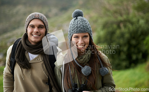 Image of Couple, portrait and hiking in forest or nature for travel, adventure or holiday for experience or fitness. Man, woman or trekking outdoor in woods for cardio, exercise or workout with care or winter