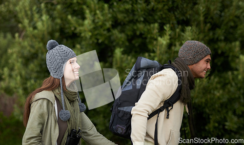 Image of Couple, happy and hiking in forest or outdoor with travel, adventure or holiday for experience or fitness. Man, woman and trekking in woods or nature for cardio, exercise or workout with backpack