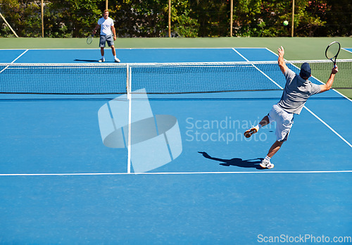 Image of Tennis, game and men with fitness, friends and competition with training and exercise with sunshine. Players, tournament and guys with rackets and court with workout and challenge in the summer