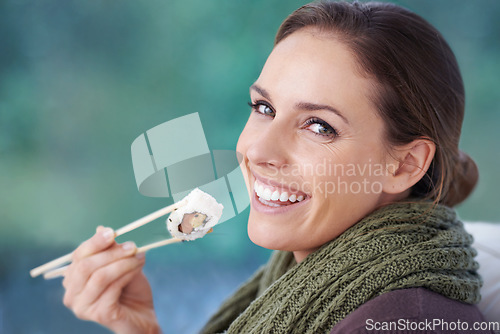 Image of Woman, sushi with chopsticks and food in portrait, eating lunch or dinner with smile, Japanese cuisine and seafood. Catering, healthy and diet, relax with meal at home and happy with dish for hunger