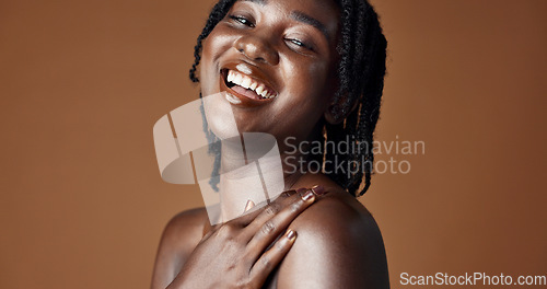 Image of Face, beauty and skincare with happy black woman in studio isolated on brown background for wellness. Portrait, aesthetic and smile for foundation cosmetics or dermatology with a natural young person