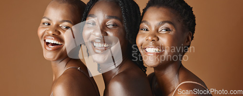 Image of Face, beauty and laughing with black woman friends in studio on a brown background for natural wellness. Portrait, skincare and funny with a group of people looking happy at antiaging treatment