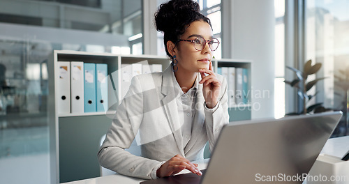 Image of Laptop, idea and thinking business woman, legal consultant or lawyer working on research report, settlement or solution plan. Law firm, computer and professional attorney problem solving project
