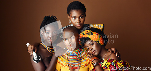 Image of African women, group and studio for culture with face, jewelry or beads necklace in clothes by background. Black people, model and indigenous fashion for friends, traditional or portrait for kwanzaa