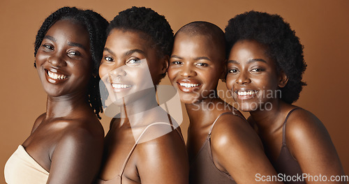 Image of Face, beauty and smile with black woman friends in studio on a brown background for natural wellness. Portrait, skincare and happy with a group of people looking confident at antiaging treatment