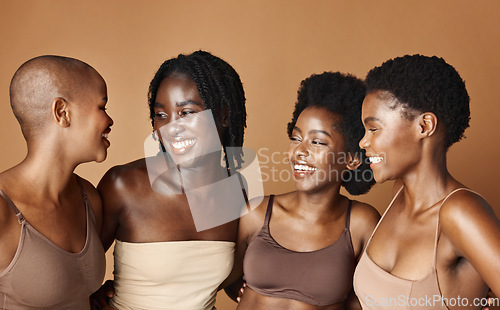 Image of Face, skincare and laughing with black woman friends in studio on a brown background for natural wellness. Portrait, beauty and smile with a group of funny people looking happy at antiaging treatment