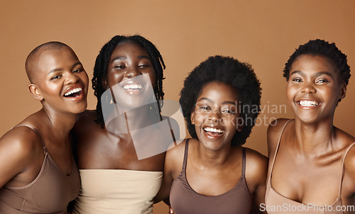 Image of Face, skincare and laughing with black woman friends in studio on a brown background for natural wellness. Portrait, beauty and smile with a group of funny people looking happy at antiaging treatment