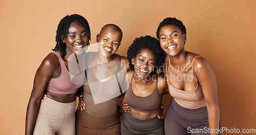 Image of Laughing, face or African models with skincare, glowing skin or results isolated on brown background. Facial dermatology, friends hug or natural beauty in studio with black women or happy people