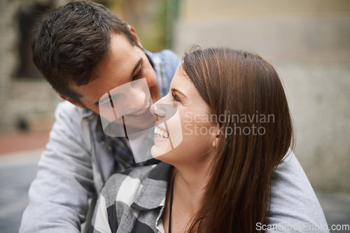 Image of Eye contact, smile and face of couple hug, relax and enjoy date on marriage honeymoon, Valentines Day or anniversary. Trust, love bond and people happy for relationship comfort, soulmate or devotion