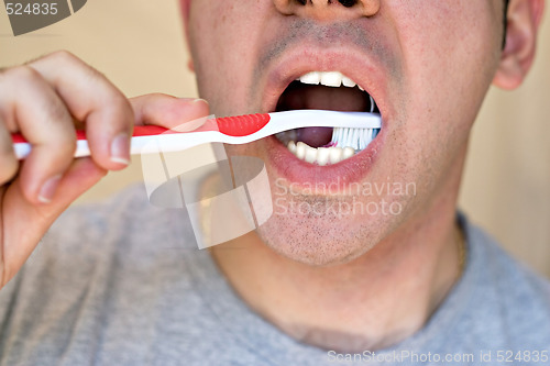 Image of Man Brushing His Teeth