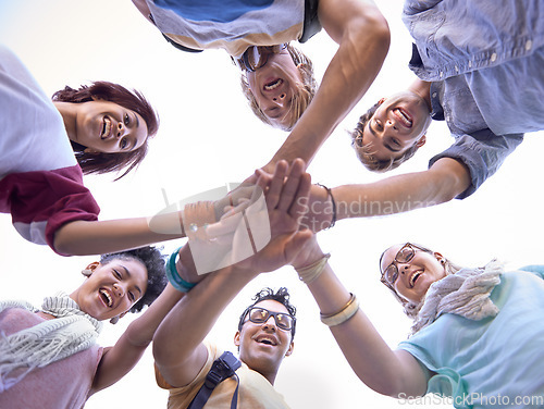 Image of Students, portrait or happy in huddle, outdoor or scholarship opportunity at college for commitment. Friends, face or diversity in education solidarity or hands together from below in collaboration