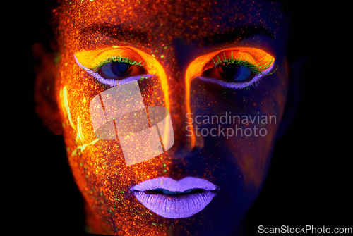 Image of Portrait, art and beauty with neon woman on black background for makeup, glitter or colorful glow. Face, fantasy and creative with confident young person in the dark for psychedelic or techno paint