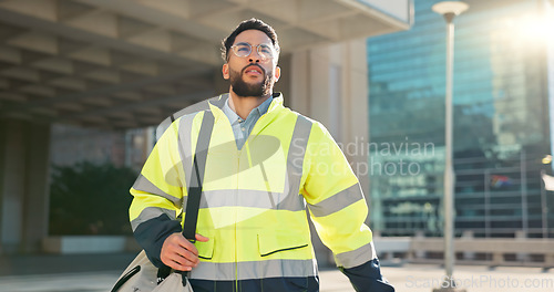 Image of Engineer man, walking and street in city, thinking and ideas on travel to work, bag and outdoor. Technician, architect or contractor on urban road or sidewalk in metro cbd for infrastructure job