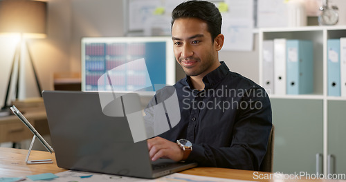 Image of Happy man in office, typing on laptop and planning online research for creative project at professional digital agency. Internet, website and networking, businessman with smile and computer for email