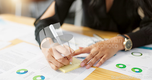 Image of Hands, business person and data analysis, writing on sticky note and paperwork review with graphs and information. Statistics, analytics and infographic documents with planning and market research