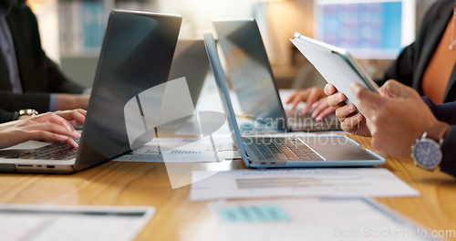 Image of Laptop, tablet and employees share information to team working on a project in collaboration together on online web.Teamwork, office and business people typing or share data analysis in meeting