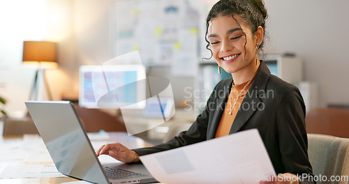 Image of Happy businesswoman in office, typing on laptop and planning online research for creative project at digital agency. Internet, website and networking, woman with smile and computer for email review.