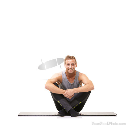 Image of Man, fitness or happy portrait on floor in studio for healthy body, muscle or training isolated on white background. Wellness, workout or strong model smile on mat for exercise, power or mockup space