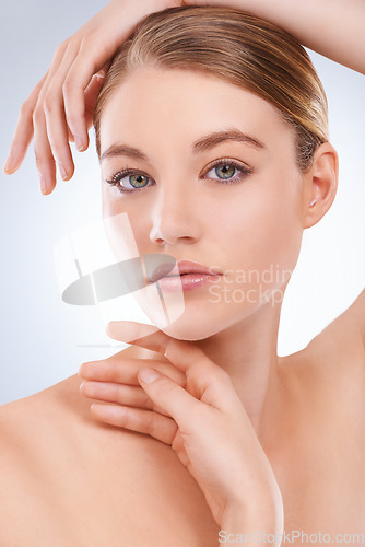 Image of Portrait, skincare and woman with cosmetics, dermatology and wellness on a white studio background. Face, person and model with self care and grooming with healthy skin, beauty or treatment with glow