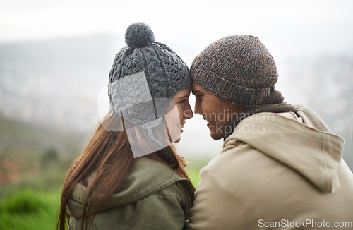 Image of Love, forehead touch and happy couple on nature journey, travel adventure or mountain climbing trip. Marriage, eye contact and face of people connect with care, support and bond in romantic moment