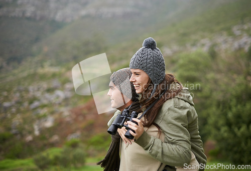 Image of Nature hiking, binocular and happy couple on piggyback ride, having fun and enjoy mountain climbing journey. Marriage, love and people looking at adventure destination, trekking view or bird watching