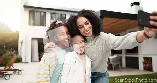 Image of Family, selfie and children outdoor with a smile, love and care in home backyard. Face of young latino woman, woman or parent for a picture with happy kids for social media post or profile picture