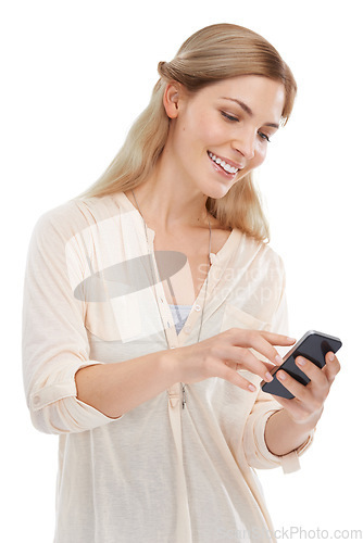 Image of Woman, smartphone and chat online for communication, social media and smile for email or text on white background. Tech, mobile app and using phone with network, connectivity and happy in studio