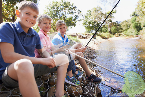 Image of Children, friends and portrait with fishing rod at river for summer holiday at countryside for vacation, learning or travel. Kids, boys and happy for catch adventure at lake for bonding, sun or relax