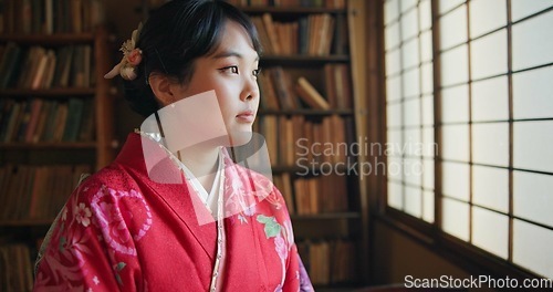 Image of Japanese, woman and kimono with relax for tradition, tea ceremony and thinking in Chashitsu by window. Thoughtful, person and vintage dress or fashion for temae, ritual and waiting for hospitality