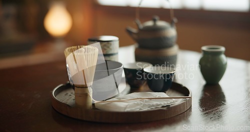 Image of Tea cup, ceremony and Japanese tradition with matcha and green brew for healing and detox practise. Temae, pot and cut for an indigenous, nutrition and wellness hot drink in a home with healthy herbs