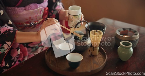 Image of Traditional, matcha and Japanese woman with tea in home with herbs, powder and flavor in teapot. Ritual, indigenous culture and hand of person with herbal beverage for drinking, ceremony and wellness