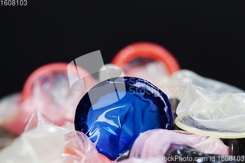 Image of a whole blue latex condom