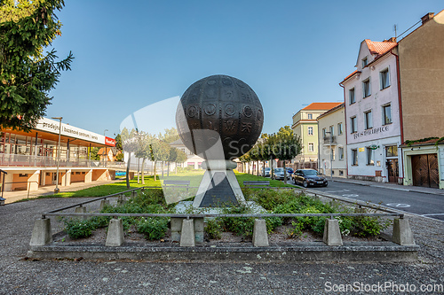 Image of Unusual monument in the form of a metal ball with embossed pictures. Litomysl, Czech Republic