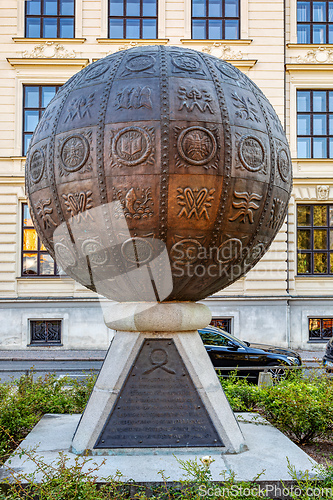 Image of Unusual monument in the form of a metal ball with embossed pictures. Litomysl, Czech Republic