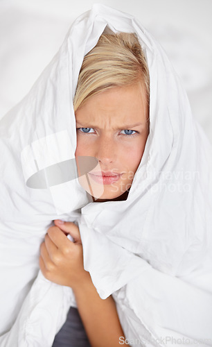 Image of Frustrated, woman and blanket to cover in portrait on bed with anger or fatigue in home with sheet on body. Tired, girl and duvet on head of person to wake up with stress in bedroom or morning